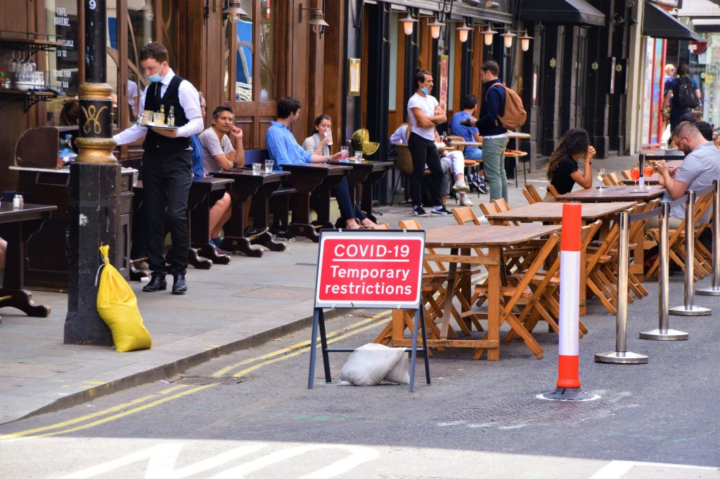 Outdoor social distancing COVID-19 steps being implemented in Old Compton Street, Soho