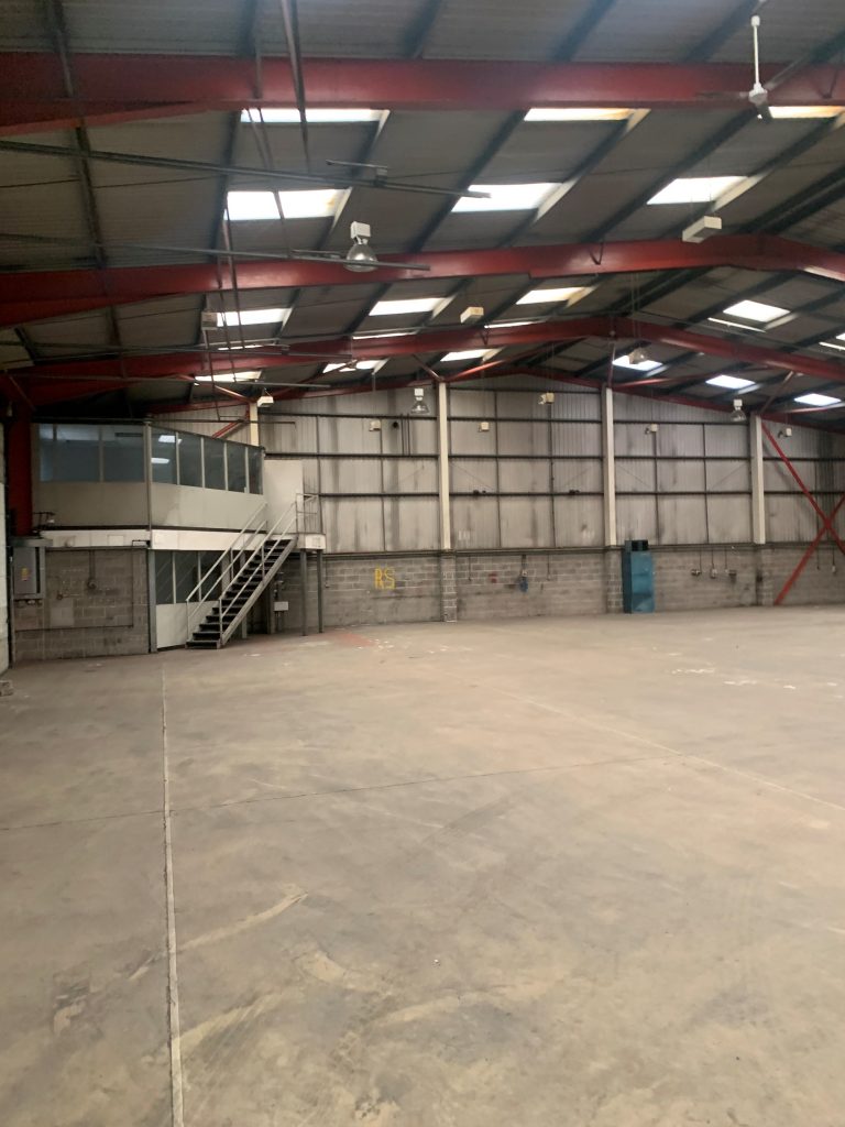 BUILDING CONSULTANTS COMPLETE FURTHER REFURBISHMENT WORKS AT COVENTRY INDUSTRIAL ESTATE 1 The warehouse underwent an extensive overhaul to upgrade it from its former condition (above) to an as-new standard.