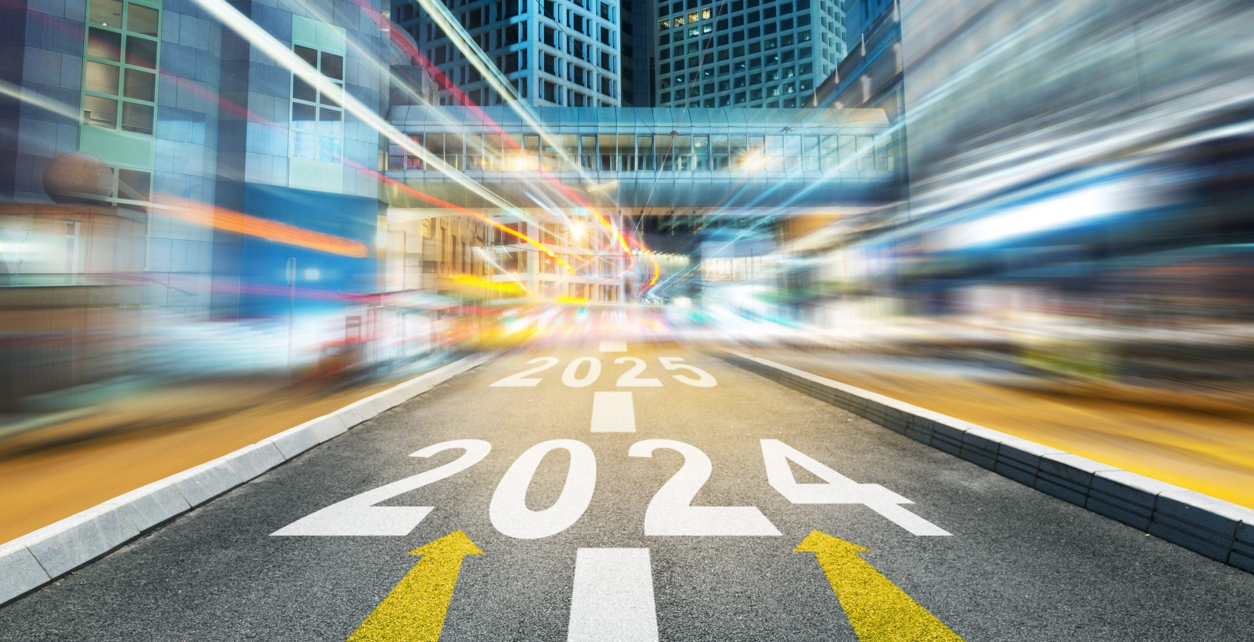 Night city street with new year number 2024 and 2025